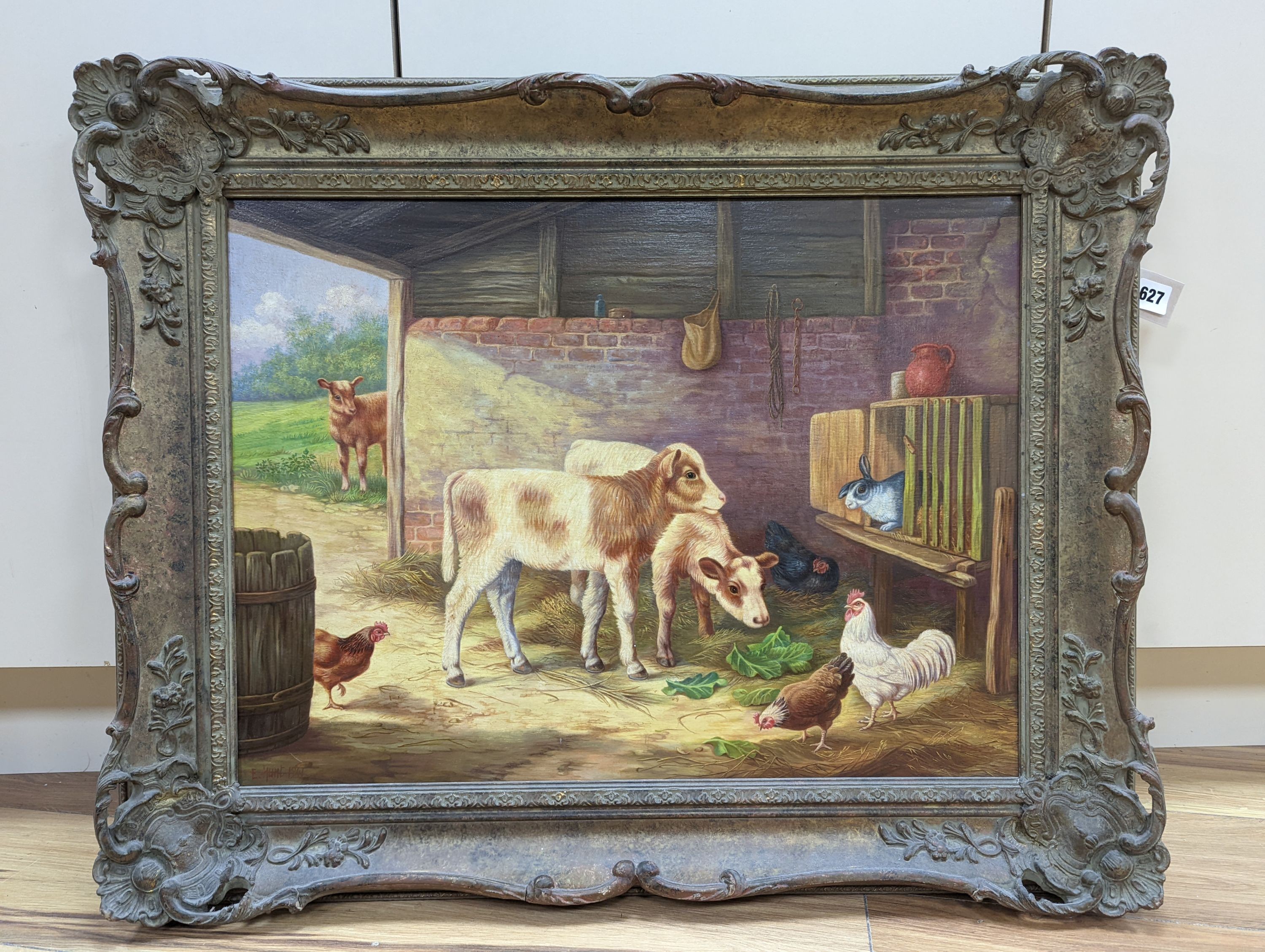 After Edgar Hunt (1876-1953), oil on canvas, Calves, chickens and rabbits in a stable, bears signature and date 1941, 44 x 60cm